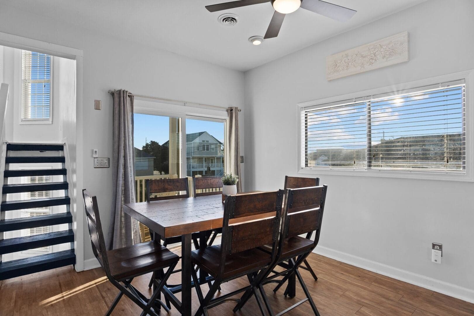 Dining table seating six with deck views