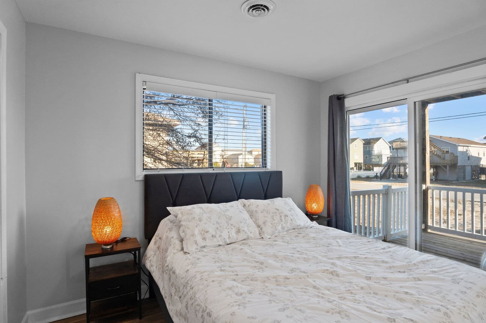 Queen Room bedroom with private deck access