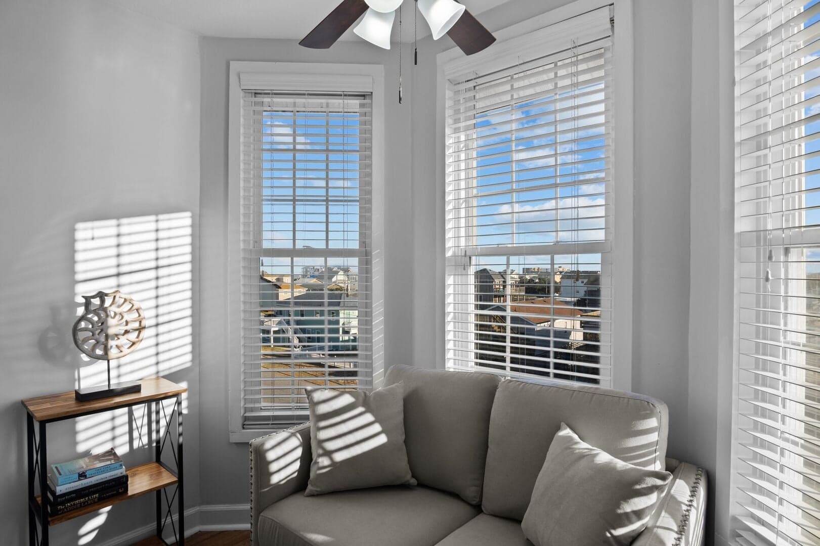 Upstairs reading nook with ocean-view windows