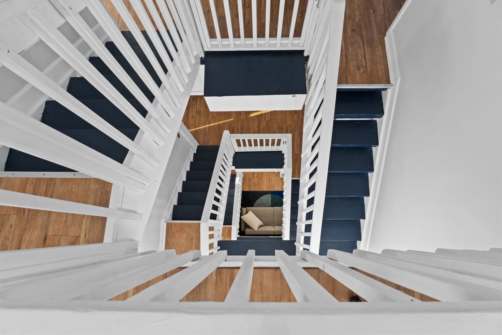 Interior stairwell connecting all four levels