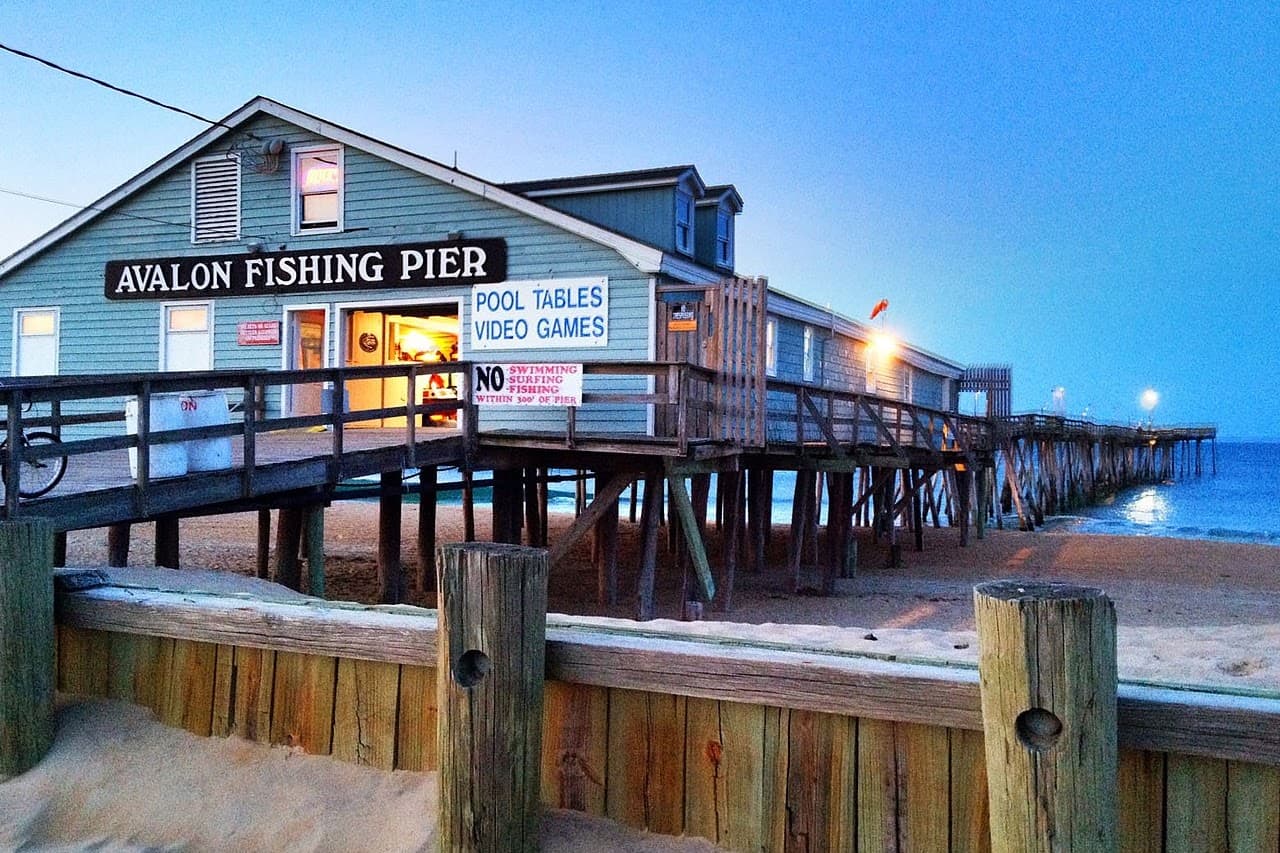 Avalon Fishing Pier at dusk in Kill Devil Hills